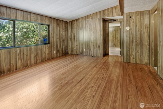 151 Dietz Dr, Quilcene, WA 98376 - empty room featuring wood finished floors and wood walls