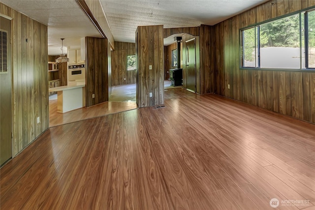 151 Dietz Dr, Quilcene, WA 98376 - spare room featuring wooden walls and wood finished floors