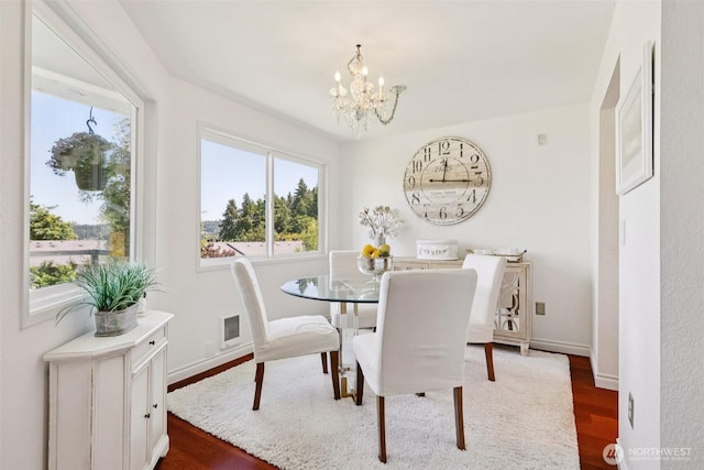 4181 W Lake Sammamish Pkwy SE Unit B301, Bellevue, WA 98008 - dining area featuring a chandelier and wood finished floors