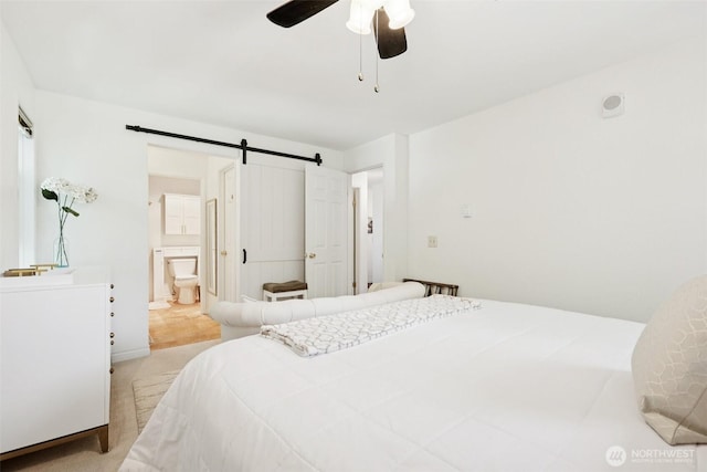 4181 W Lake Sammamish Pkwy SE Unit B301, Bellevue, WA 98008 - bedroom featuring a barn door, light colored carpet, ensuite bathroom, and ceiling fan