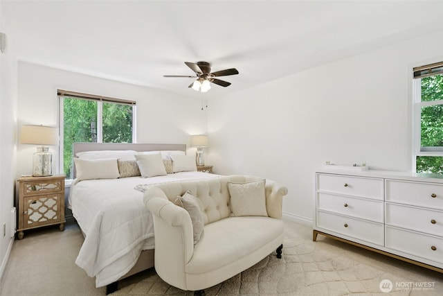 4181 W Lake Sammamish Pkwy SE Unit B301, Bellevue, WA 98008 - carpeted bedroom featuring baseboards and a ceiling fan