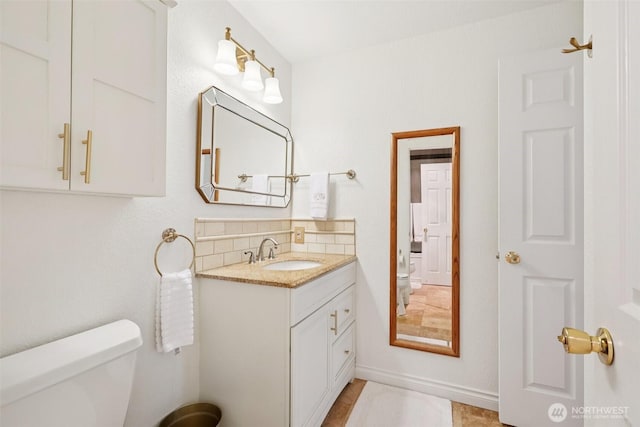 4181 W Lake Sammamish Pkwy SE Unit B301, Bellevue, WA 98008 - bathroom featuring decorative backsplash and vanity