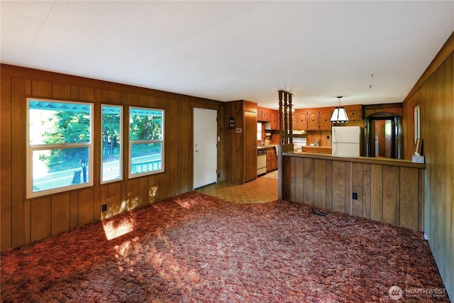 31809 148th Way SE, Auburn, WA 98092 - unfurnished living room featuring wood walls and light colored carpet