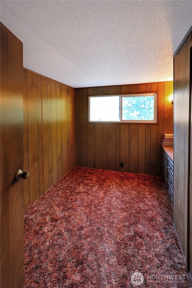 31809 148th Way SE, Auburn, WA 98092 - empty room with carpet floors, wood walls, and a textured ceiling