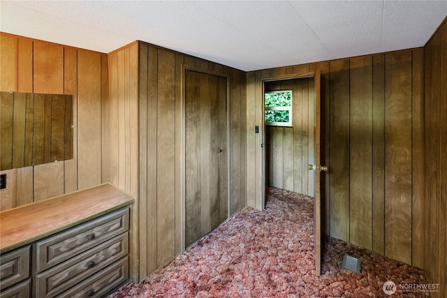 31809 148th Way SE, Auburn, WA 98092 - hall featuring wood walls, carpet floors, and a textured ceiling