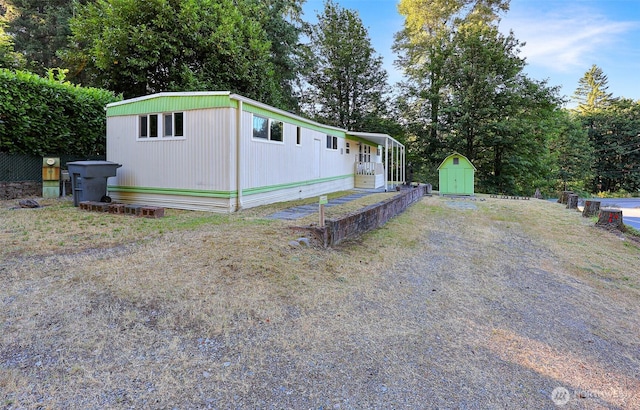31809 148th Way SE, Auburn, WA 98092 - manufactured / mobile home with a shed