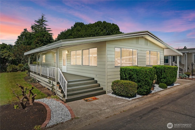 1402 22nd St NE Unit 39, Auburn, WA 98002 - view of front of house with covered porch