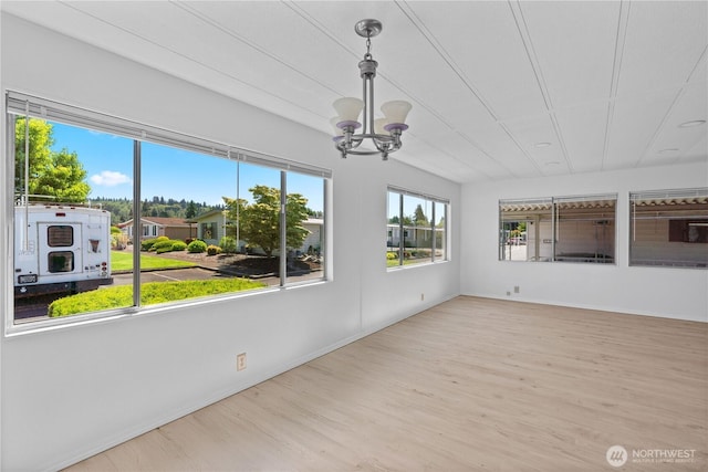 1402 22nd St NE Unit 39, Auburn, WA 98002 - unfurnished sunroom featuring a chandelier