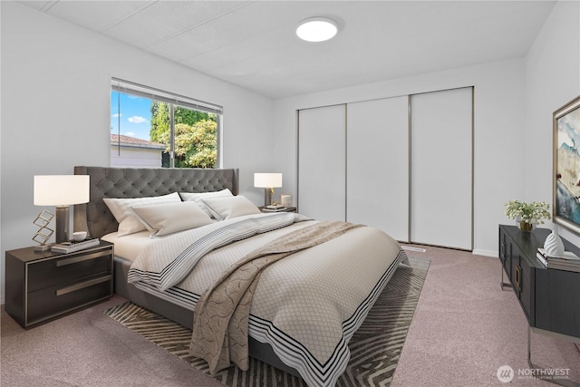 1402 22nd St NE Unit 39, Auburn, WA 98002 - carpeted bedroom featuring a closet and baseboards