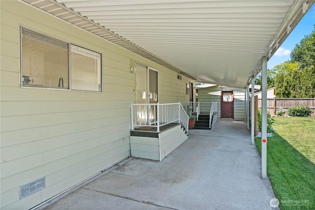 1402 22nd St NE Unit 39, Auburn, WA 98002 - view of patio with a carport