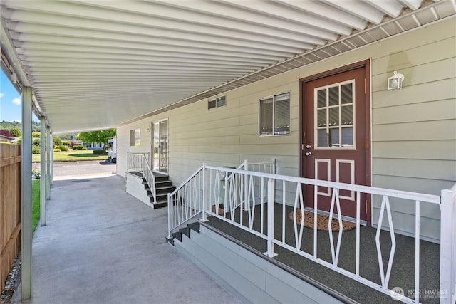 1402 22nd St NE Unit 39, Auburn, WA 98002 - view of patio with a carport