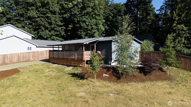7113 E Dakota St, Port Orchard, WA 98366 - view of front of house featuring a fenced backyard and a wooden deck