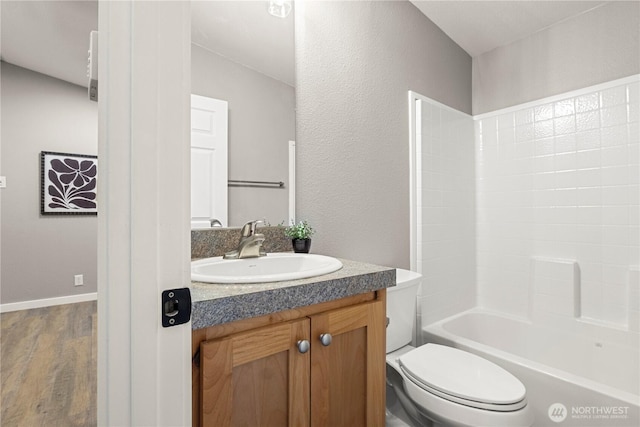 7113 E Dakota St, Port Orchard, WA 98366 - bathroom featuring vanity, wood finished floors, and shower / tub combination