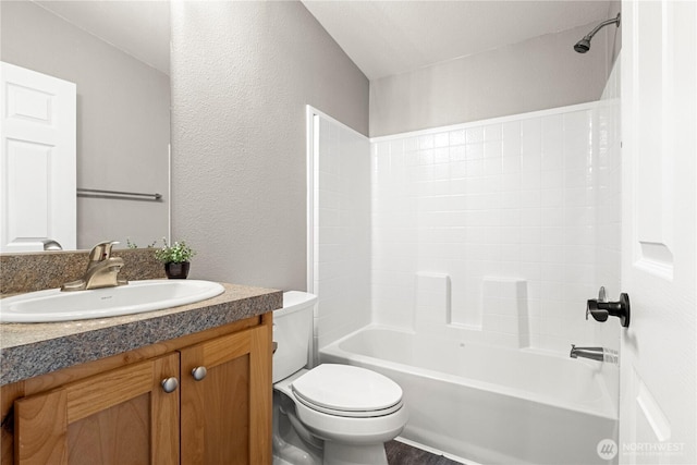 7113 E Dakota St, Port Orchard, WA 98366 - bathroom featuring vanity, a textured wall, and shower / washtub combination