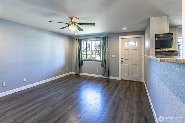 406 Brown Way SE, Orting, WA 98360 - entrance foyer with ceiling fan, dark wood-type flooring, and recessed lighting