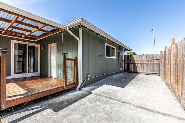 406 Brown Way SE, Orting, WA 98360 - doorway to property with a wooden deck