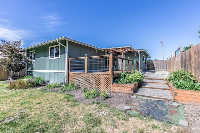 406 Brown Way SE, Orting, WA 98360 - view of home's exterior with a wooden deck