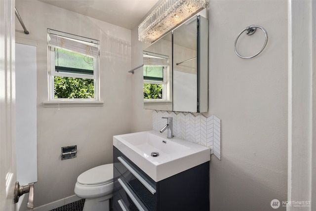 4006 147th Pl, Bellevue, WA 98006 - bathroom with vanity, tasteful backsplash, and a shower