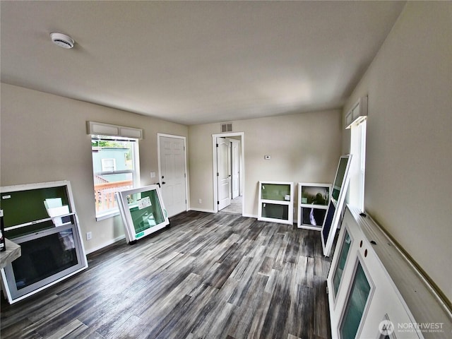 1303 30th Unit 24, Seaview, WA 98640 - unfurnished living room with dark wood-style flooring