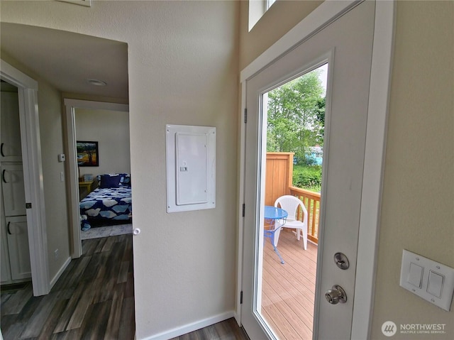 1303 30th Unit 2, Seaview, WA 98644 - entryway with electric panel and dark wood-type flooring
