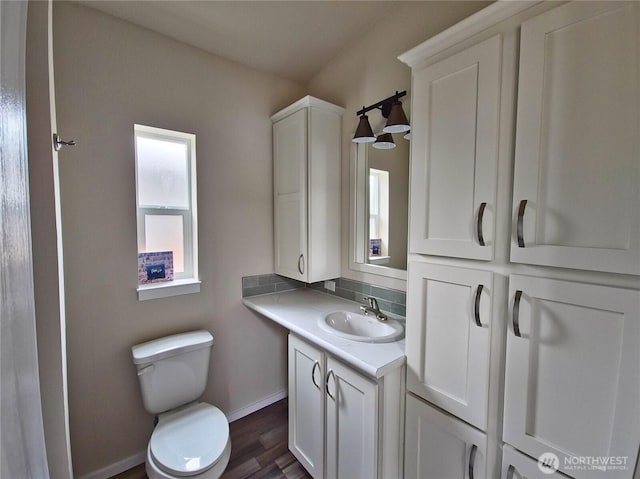 1303 30th Unit 2, Seaview, WA 98644 - bathroom featuring vanity and wood finished floors