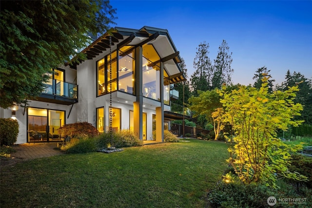 4014 E Mercer Way, Mercer Island, WA 98040 - back of property featuring a balcony, a yard, and stucco siding