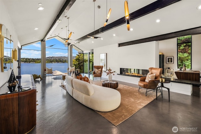 4014 E Mercer Way, Mercer Island, WA 98040 - living area with concrete flooring, a water view, expansive windows, recessed lighting, and a glass covered fireplace