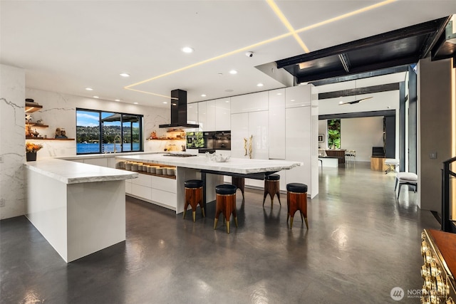 4014 E Mercer Way, Mercer Island, WA 98040 - kitchen featuring ventilation hood, modern cabinets, white cabinetry, finished concrete floors, and recessed lighting