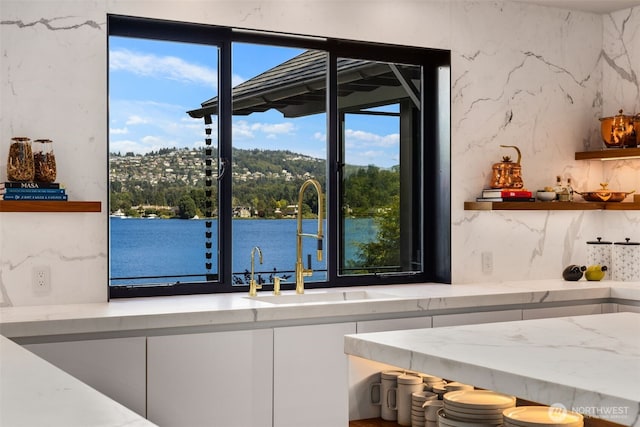 4014 E Mercer Way, Mercer Island, WA 98040 - kitchen view of open shelves and light stone countertops