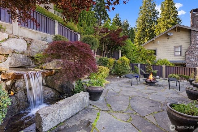 4014 E Mercer Way, Mercer Island, WA 98040 - view of patio / terrace featuring an outdoor fire pit