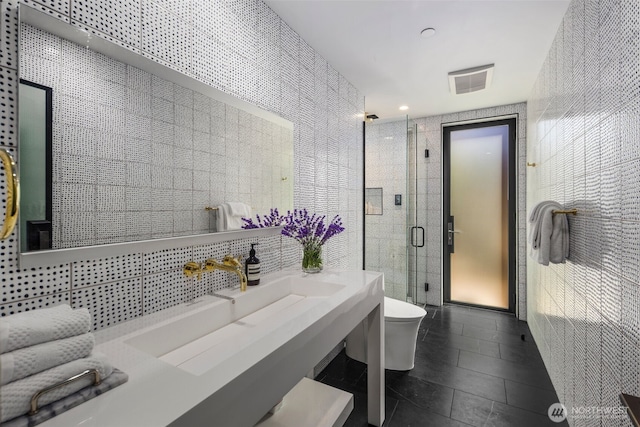 4014 E Mercer Way, Mercer Island, WA 98040 - bathroom featuring tile walls, a stall shower, and tile patterned flooring