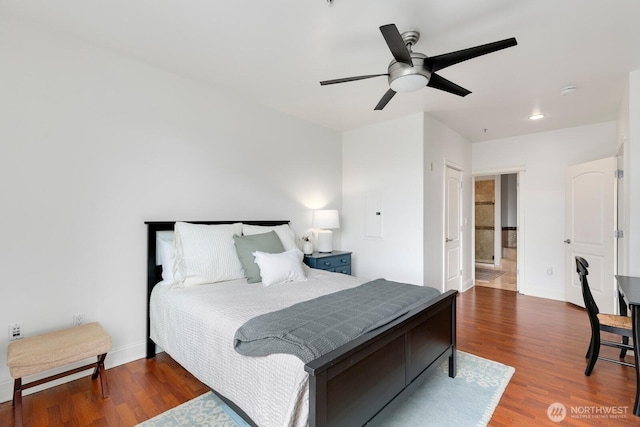 2551 Thorndyke Ave W Unit 302, Seattle, WA 98199 - bedroom with wood finished floors and a ceiling fan
