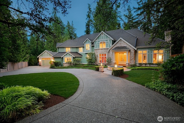13695 NE 32nd Pl, Bellevue, WA 98005 - view of front of property with concrete driveway, stone siding, and an attached garage