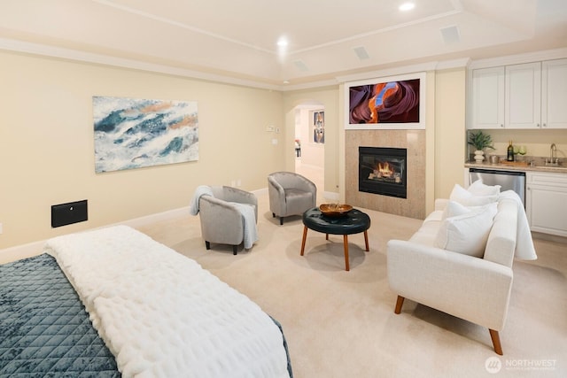 13695 NE 32nd Pl, Bellevue, WA 98005 - bedroom featuring light colored carpet, arched walkways, a tray ceiling, wet bar, and recessed lighting