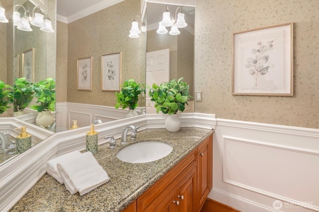 13695 NE 32nd Pl, Bellevue, WA 98005 - bathroom featuring a chandelier, wallpapered walls, wainscoting, vanity, and crown molding
