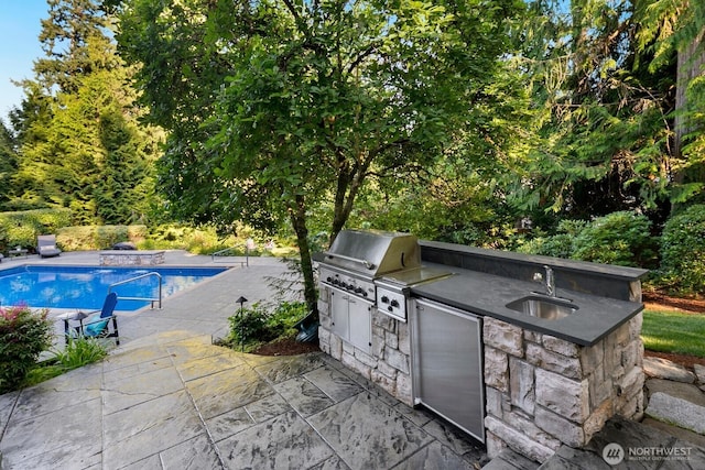 13695 NE 32nd Pl, Bellevue, WA 98005 - swimming pool featuring area for grilling and a patio area