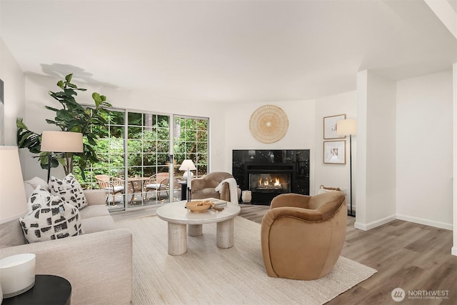 8527 134th Ct NE, Redmond, WA 98052 - living area featuring wood finished floors and a high end fireplace