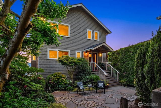 7117 Beach Dr SW, Seattle, WA 98136 - view of front of property with a patio