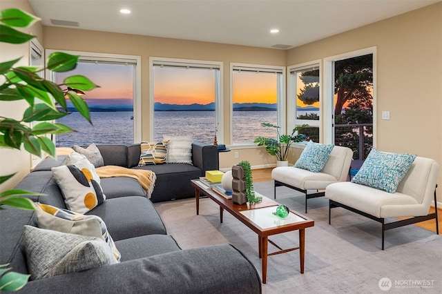 7117 Beach Dr SW, Seattle, WA 98136 - living room featuring recessed lighting and a water view