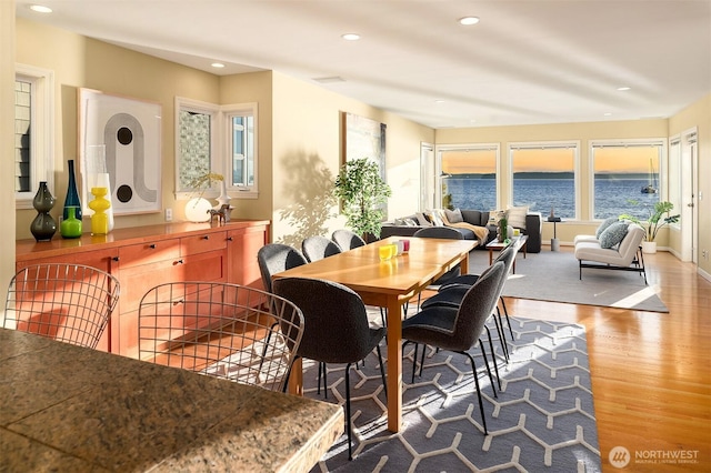 7117 Beach Dr SW, Seattle, WA 98136 - dining space featuring wood finished floors and recessed lighting