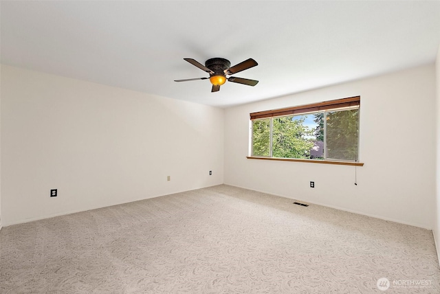 14013 116th Ave E, Puyallup, WA 98374 - empty room featuring ceiling fan and carpet