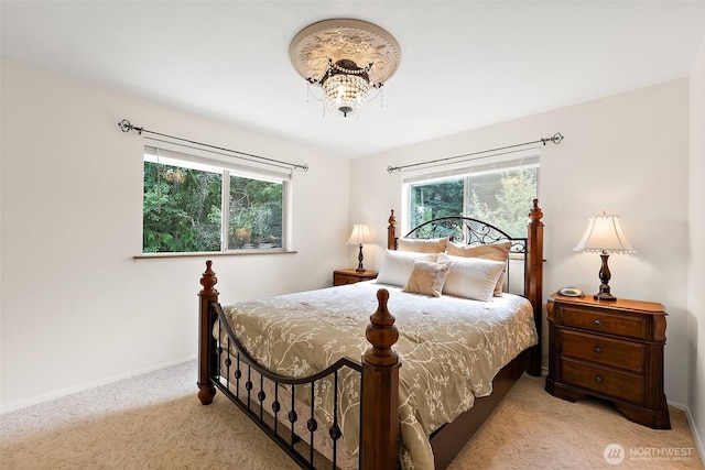 14013 116th Ave E, Puyallup, WA 98374 - bedroom with carpet flooring and a chandelier