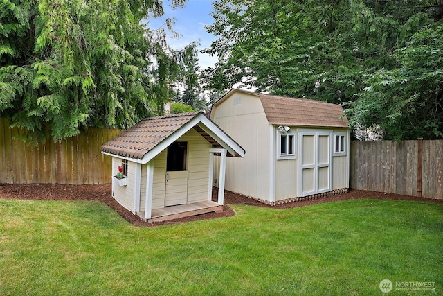 14013 116th Ave E, Puyallup, WA 98374 - view of shed featuring a fenced backyard