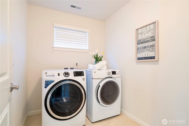 4529 185th Pl SE, Bothell, WA 98012 - washroom featuring separate washer and dryer and baseboards