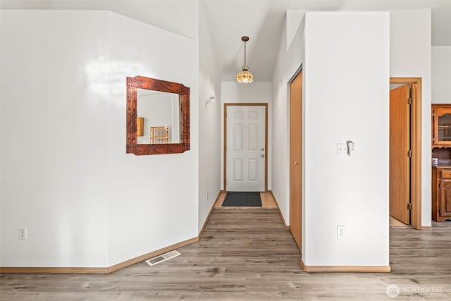 1346 Chatham Dr SE, Olympia, WA 98513 - hall with light wood-type flooring and vaulted ceiling