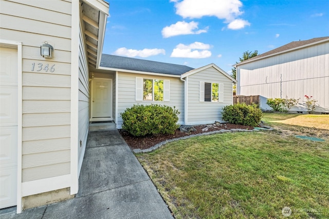 1346 Chatham Dr SE, Olympia, WA 98513 - doorway to property with a lawn and a shingled roof