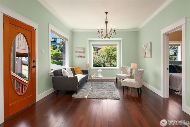 6208 Fremont Ave N, Seattle, WA 98103 - living area with a chandelier, healthy amount of natural light, dark wood finished floors, and ornamental molding