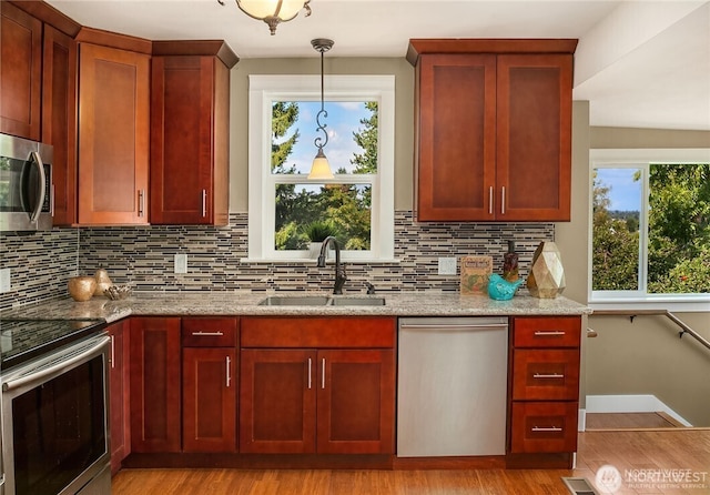 6208 Fremont Ave N, Seattle, WA 98103 - kitchen with stainless steel appliances and dark brown cabinets