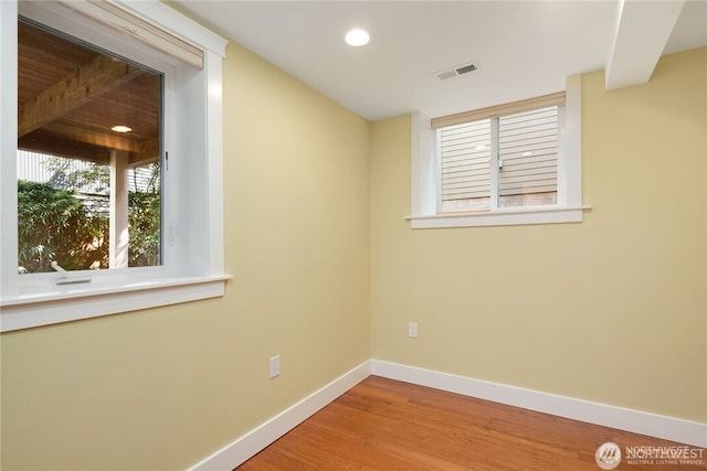 6208 Fremont Ave N, Seattle, WA 98103 - unfurnished room with wood finished floors and recessed lighting