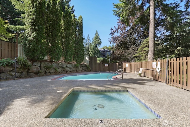 12742 NE 116th Ln Unit J23, Kirkland, WA 98034 - community pool with a patio